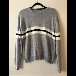 Grey long sleeve sweater.